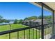 Enjoy the beautiful waterfront views from this balcony overlooking lush green spaces and the lake at 1152 Grove St, Maitland, FL 32751