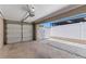 Attached garage featuring an automatic door, with a fenced and gated exterior side yard at 1152 Grove St, Maitland, FL 32751