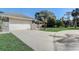 Long and spacious driveway leading to the two-car garage at 1155 Collins Ave, Orange City, FL 32763
