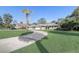 Charming single Gathering home with well maintained front yard and long driveway at 1155 Collins Ave, Orange City, FL 32763