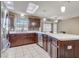 Beautiful kitchen features stainless steel appliances and large sink under window at 1155 Collins Ave, Orange City, FL 32763