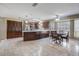 Open concept kitchen with island and eat in kitchen and stainless steel appliances at 1155 Collins Ave, Orange City, FL 32763