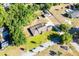 Aerial view showcasing a home with lush lawns and a neatly manicured yard at 117 Orange Ridge Dr, Longwood, FL 32779