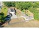 Expansive aerial view of a single-Gathering home with a large yard and mature trees at 117 Orange Ridge Dr, Longwood, FL 32779