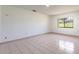 Simple bedroom has natural light from the window at 117 Orange Ridge Dr, Longwood, FL 32779