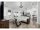 Open-concept living room and dining room, with bright white interior and natural light at 15532 Kensington Trl, Clermont, FL 34711