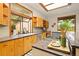 Spacious kitchen with modern appliances, a sink with a view, and granite countertops at 1555 Waterwitch Dr, Orlando, FL 32806