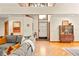 Bright living room featuring hardwood floors and custom woodworking at 1555 Waterwitch Dr, Orlando, FL 32806