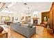 Spacious living room with fireplace, hardwood floors, and open layout at 1555 Waterwitch Dr, Orlando, FL 32806