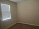 Bedroom featuring neutral walls, carpeted flooring and window for natural light at 1711 Penrith Loop, Orlando, FL 32824