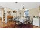 Traditional dining area with ample seating, adjacent to the kitchen at 18600 Old Cheney Hwy, Orlando, FL 32820