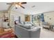 Bright living space with a sliding door that opens to a view of the backyard at 18600 Old Cheney Hwy, Orlando, FL 32820