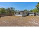 The spacious backyard is enclosed with a wooden fence, offering privacy at 197 Flame Ave, Maitland, FL 32751