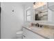 Bathroom boasts a granite countertop, shower, and modern fixtures at 197 Flame Ave, Maitland, FL 32751