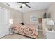Bedroom with light wood floors, a closet, and a ceiling fan at 197 Flame Ave, Maitland, FL 32751