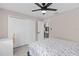 Bedroom features light wood floors, a closet, and a ceiling fan at 197 Flame Ave, Maitland, FL 32751
