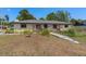Well-maintained home with an inviting front yard and walkway to the entrance at 197 Flame Ave, Maitland, FL 32751