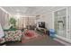 The spacious living room features natural light and a cozy seating area at 197 Flame Ave, Maitland, FL 32751