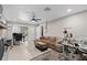 Spacious living area with a fireplace, desk, and sewing area, offering a flexible living space at 197 Flame Ave, Maitland, FL 32751