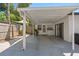 Covered patio with concrete flooring and access to the home's interior at 197 Flame Ave, Maitland, FL 32751