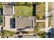 An overhead view of the home showing the backyard, detached garage, and landscaping at 2107 Delaney Ave, Orlando, FL 32806