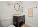 Simple bathroom showcasing a toilet and vanity with countertop space at 2107 Delaney Ave, Orlando, FL 32806