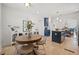 Bright kitchen with island, modern appliances, and adjoining dining area at 2107 Delaney Ave, Orlando, FL 32806