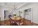 Convenient laundry room tucked away in the dining area with washer and dryer at 2107 Delaney Ave, Orlando, FL 32806