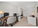 Bright home office features a wooden desk, comfortable chair, and ample storage space at 2107 Delaney Ave, Orlando, FL 32806