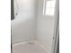 Bathroom area showcasing a rough-in toilet, large window, and clean bright space at 2342 Broadbrook Drive, St Cloud, FL 34771