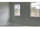 Bright bedroom featuring natural light from two large windows at 2342 Broadbrook Drive, St Cloud, FL 34771