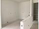 Unfinished interior view with a partial wall and walk-in closet at 2342 Broadbrook Drive, St Cloud, FL 34771