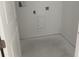 Laundry room features connections for washer and dryer at 2342 Broadbrook Drive, St Cloud, FL 34771