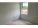 Bright room interior featuring neutral walls and a large window at 2342 Broadbrook Drive, St Cloud, FL 34771