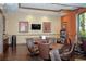 Relaxing game room with tables, poker-themed decor, and a television at 2530 Stargrass Cir, Clermont, FL 34715