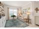 Bright living room featuring a comfortable sofa, neutral tones, a large window, and modern decor at 2530 Stargrass Cir, Clermont, FL 34715