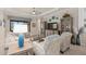 Bright living room with neutral tones, open layout, and view of sliding glass door at 2530 Stargrass Cir, Clermont, FL 34715