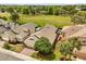 Beautiful aerial view of home, a manicured lawn, mature trees, and a brick driveway in a lush neighborhood at 2626 Clarinet Dr, Orlando, FL 32837