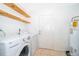 Clean laundry room with modern washer and dryer at 3024 Sutton Dr, Orlando, FL 32810