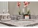 Close-up of a granite bathroom countertop with a modern sink and decorative accents at 30276 Armenia Rd, Leesburg, FL 34748