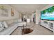 Spacious living area offering an open floor plan to the kitchen and dining area at 30276 Armenia Rd, Leesburg, FL 34748