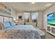 Serene bedroom with soft lighting, neutral walls, and comfortable furnishings at 30276 Armenia Rd, Leesburg, FL 34748