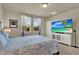 Relaxing bedroom with large windows, soft carpet, and a serene ambiance at 30276 Armenia Rd, Leesburg, FL 34748