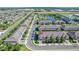 Aerial view of townhomes in a meticulously landscaped community at 335 Merry Brook Cir, Sanford, FL 32771