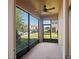 Relaxing screened patio offering views of the neighborhood and surrounding greenery at 335 Merry Brook Cir, Sanford, FL 32771