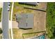 Bird's eye view of the home, roof, and driveway at 340 Irving Bend Dr, Groveland, FL 34736