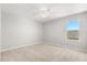 Bright bedroom featuring carpet and a window with natural light at 340 Irving Bend Dr, Groveland, FL 34736