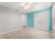 Bright bedroom featuring carpet, large closet and two-toned walls at 340 Irving Bend Dr, Groveland, FL 34736