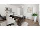 Inviting home office featuring modern decor, sleek desk, and large windows that provide plenty of natural light at 340 Irving Bend Dr, Groveland, FL 34736