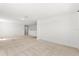 Spacious living room with neutral carpet and light-filled interior at 340 Irving Bend Dr, Groveland, FL 34736